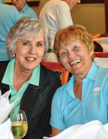 OLNGA members Marcy Griffith (left) and Suevonne Negaard socialize at a luncheon.