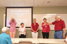 Marty Klemes involves students in his spring class as he explains the universe beyond the solar system.