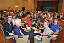 Capt. Cory Evans (center) and his table of ladies; Photo by Brian Curry