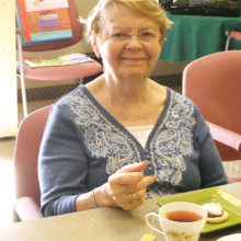 Joyce enjoys her cup of tea!
