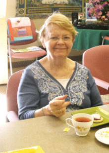 Joyce enjoys her cup of tea!