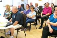 Director Howard Hummel and Assistant Director Carol Horowitz take notes as they watch auditions. Watching other people read can sometimes help an actor adjust his own reading.