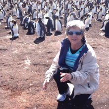Paula Cunkelman up close and personal with the King Penguins!