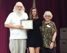 Roger Edmonds and Sandy Pallett presented Alli Halliday a check and a certificate at the last Sun Lakes Community Theatre meeting. SLCT is proud to support local theater in area schools.