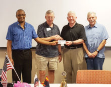 Shown here are club President Dan Albertson [left] and President-Elect Tom Adamson [left center] presenting a check representing the proceeds of the ride to Project Healing Waters Fly Fishing to Phoenix chapter Director Norm Johnson [center right] and Project Healing Waters volunteer and Hooked on Healing Veterans ride committee member Mark Pearlstein. Proceeds will be used to fund fly tying and rod building classes as well as monthly social gatherings for the veterans they support through the V.A.