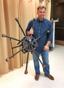 Doug Andriuk, President of the Phoenix Area Drone Users Group, was the featured speaker at the Sun Lakes Aero Club gathering March 21. Here he is shown with a giant drone he built from a kit (photo by J.R. Scheidereiter).