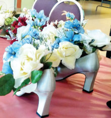 The Sun Lakes Women’s Association had some pretty special decorations and door prizes at the Spring Luncheon on March 21. These were created with many pairs of beautiful fancy shoes and silk flowers – all donated items to the association.