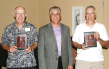 Spirit winners Ken Brenden (left) and Dennis LePore (right) with SLSSA President Sam Giordano (center). (Photo courtesy of Core Photography).