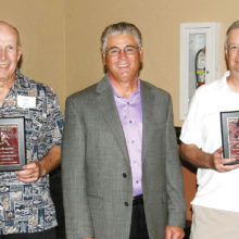 Spirit winners Ken Brenden (left) and Dennis LePore (right) with SLSSA President Sam Giordano (center). (Photo courtesy of Core Photography).