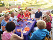 Cheers members relax and enjoy wine tasting! Photo courtesy of Dottie Meade.