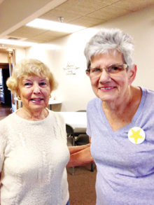 Golden Goalie Margaret (left) congratulates Toni on reaching her goal.