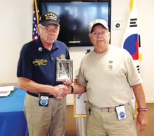 Mick Tucker (left) receiving award for past Commander from Jay Sanderson, present Commander
