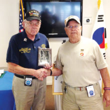 Mick Tucker (left) receiving award for past Commander from Jay Sanderson, present Commander