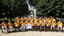 Van Christman (front row, fourth from left) holds a salute along with other members of his Honor Flight Arizona group at the World War II Memorial in Washington, D.C.