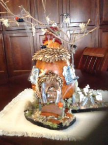 Gourd haunted house created by member Kathy Baylor. Very creative and great use of all materials!