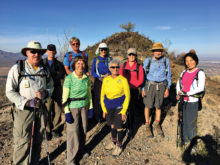 Sun Lakes Hiking Club members stay hydrated on the Alta Trail at South Mountain.