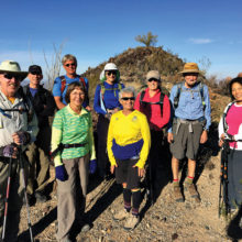 Sun Lakes Hiking Club members stay hydrated on the Alta Trail at South Mountain.