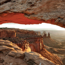 Photographers capturing Mesa Arch and Canyonlands N.P. by Burt Williams