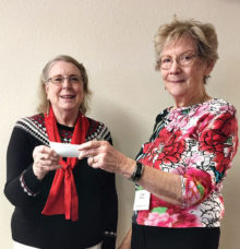 Sun Lakes Garden Club donating to Neighbors Who Care at December meeting