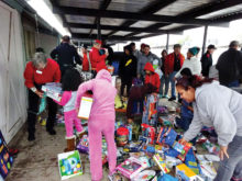 The East Valley Marines donate their time to distribute toys on Christmas Eve as part of the Toys for Tots program.