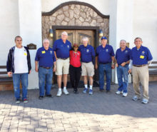 Pictured, left to right, are K of C members Rich Sobczak, Marcel Baadte, Duane Papke, Alyta Hilliard (PE/Health Instructor at the school), Stu Adair, Ed Berger, Bill Triquart and Mario Del Col. Not pictured are Al Forte and Maynard Iverson.