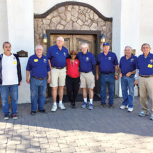 Pictured, left to right, are K of C members Rich Sobczak, Marcel Baadte, Duane Papke, Alyta Hilliard (PE/Health Instructor at the school), Stu Adair, Ed Berger, Bill Triquart and Mario Del Col. Not pictured are Al Forte and Maynard Iverson.