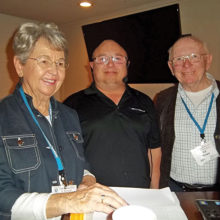 Computer Booters Club President Janet Quade (left) with February’s guest speaker Bill Evans and club Secretary Ed Nowe