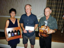 Door prize winners from the February dance are (from left to right) Sharon Lepdyke, Glen Ross and Ron Frye.