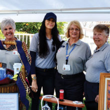 SLFD’s volunteer Community Assistance Program members (left to right) Bobbie Rubin, Sheila Barton, Kristin Rose, Maureen Morrissey, Donna Quinn and Shirley Hutchings manned the raffle booth at Art at the Lakes which benefited the Sun Lakes Emergency Relief Fund administered by the Sun Lakes firefighters union. Photo by Brian Curry.