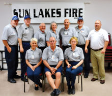 The 2017 class of the Sun Lakes Fire District’s Community Assistance Program, bottom row from left: Suzanne Boak, Carl Schell and Linda Hewitt; top row from left: Lead Instructor Brian Curry, Head of Training Bob Bruce, Benny Davis, Judy Banyai, Jim Mottern, CAP Coordinator Scott Jaeger and SLFD Chief Troy Maloney (photo by Mike Berry)