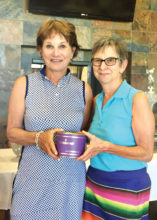 Mary Dyrseth is the 2nd flight winner pictured with club President Betty Schechter