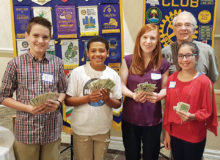 Pictured (left to right) are Ty Schmidt, Kade McIntyre, Katie Villaorduna (teacher) and Isa Mullen with Sun Lakes Rotary Club President Bill McCoach.