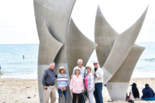 Dale and Dianne Probst, Jim and Peggy Hall and Vic and Joanna Hermann at Omaha Beach, France, in July