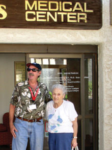 Lottie gets assistance from Neighbors Who Care volunteer Jim Brown.