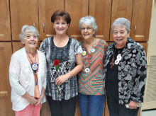 Debbie has reached her weight-loss goal. Left to right: Jeannie, Debbie, Dimple and Jeri are celebrating.