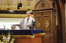 Rabbi Irwin Wiener leading services