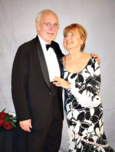 Emmett and Carmela Babler entering the San Tan Ballroom for the 25th Anniversary Black and White Ball that was held on January 12, 2019. Carmella acquired her gown in Spain while traveling. It really created a festive mood as she and Emmett entered the ballroom. Emmett and Carmela are longtime members of the club. Carmela has been instrumental in sharing her leadership skills with the club. Her practical ideas and commitment to our mission have been key to the transition to the Cottonwood venue.