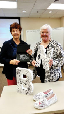 Kathie Neffenger (right) with Jean Culver (left) offer their popular art class.