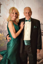 Larry and Pat Wolfe entering the San Tan Ballroom for the Emerald City Celtic Soiree that was held on March 9, 2019. When they walked in, you really felt that Irish spirit. We have appreciated the Wolfes' participation in the club as volunteers, board members, past presidents, and tutors. They have been faithful to the club's mission and have assisted the club in so many ways over the years. We want to thank them for their insights and tireless commitment to make the club special.