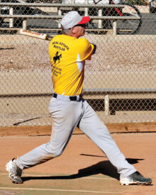 Tom Kasunic shows his homerun swing. (Courtesy of Core Photography)
