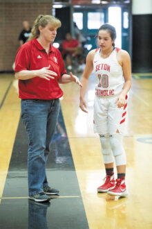 Coach Karen self instructs Megan Giacobbi (Class of 2019) during a game.