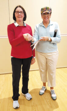 Anne Annis giving Sharon Bowditch the State Medallion Award