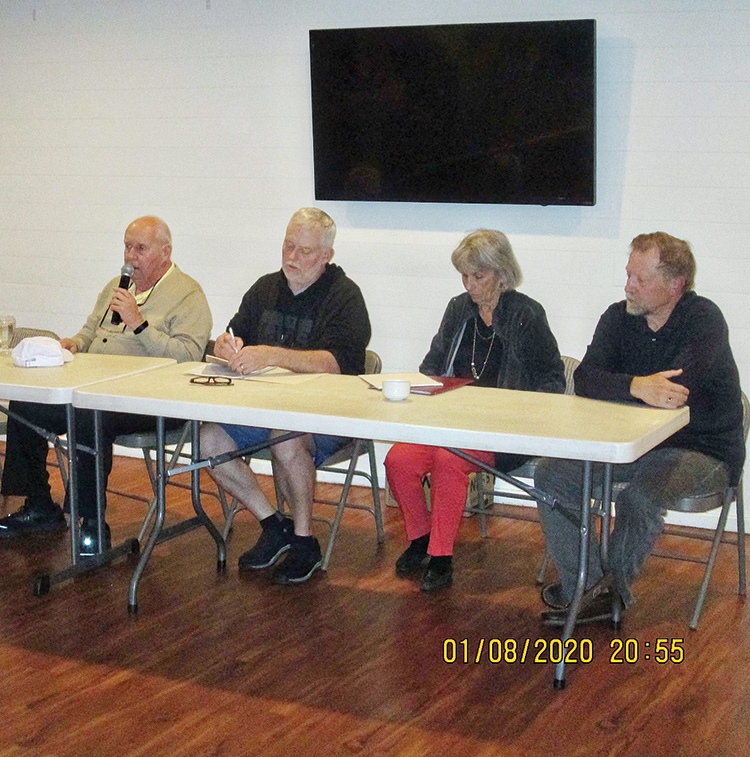 At the table are Tony Horn, Ed Campion, Dan Thorsen, Faye Haynes, and Rick Kendall.