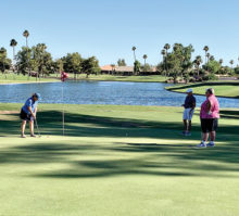 Summer play on Oakwood Palms number 7. Golfers (left to right): Patty Fanzo, Pam Matassarin, and Lynn Matassarin