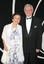 Pictured are Gerhard and Eva Vogelsang entering the ballroom for the Nov. 14, 2014, Live and Let Dance soiree. This dance featured James Bond-themed decorations and musical selections. Gerhard and Eva can always be counted upon to get into the dance theme. Everyone had great fun posing for pictures in their theme-appropriate attire. The meal menu says it all: License to Kill Waldorf salad, The Man from Barbarossa braised beef brisket, SkyFall roasted airline chicken, For Your Eyes Only handmade squash ravioli, Gold Finger-ling potatoes, Thunderball broccoli, and Die Another Day carrot cake. We are looking forward to another great season.