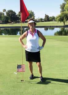 SLLGA President Nancy O'Donnell planting her flag