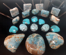 Doug Williams' turquoise is in different phases, starting with raw stone slab and ending in a cabochon.
