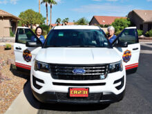 Arizona Fire & Medical Authority Fire Corps members LouAnn Sedgwick (left) and Colleen Mitchell (right) are just waiting to return to “active duty” in Sun Lakes, as AFMA medics do battle with COVID-19. (Photo by Brian Curry)