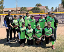 The 2021 Lady Sluggers: kneeling (left to right): Crissy Conners, Roseanne Kuefner, Ann Buckley, and Lynn Casey; back row (left to right): Coach Scott Steinmann, Suzy Steinmann, Ann Hegney, Sharon Bergan, Teresa Dorman, Manager Terry Finley, Sue Rodke, and Mary Alka