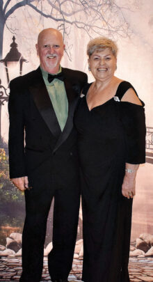 Pictured are Michael and Bety Dar entering the ballroom on March 14, 2020, for the Top Hats and Cocktails Soiree. That was the last dance since the COVID-19 interruption. We are especially looking forward to greeting attendees as they enter our next dance for the champagne reception that begins a lovely evening of dinner and dancing on Saturday, Nov. 13, 2021, at 5:45 p.m.
